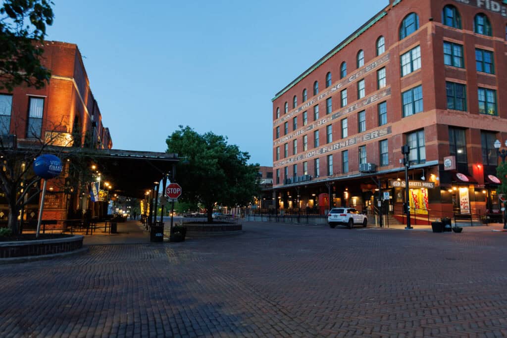 Morning shot of cobblestone streets and old brick buildings in the Old Market, Omaha
