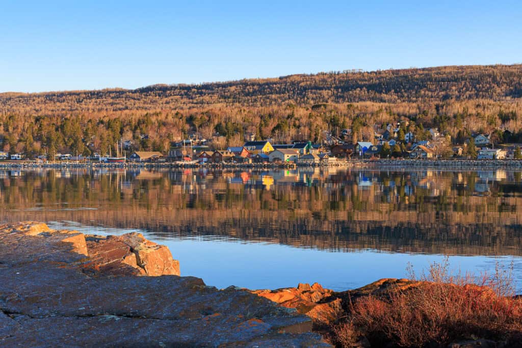 Town of Grand Marais, reflecting in the harbor of Lake Superior.
