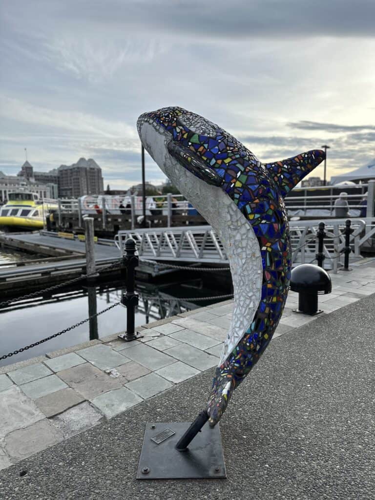 A giant sparkling whale sculpture on the harbor in Victoria.
