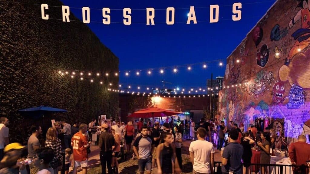 As live music filled the air in this nook in the east Crossroads in Kansas City, First Friday goers mingled along 18th Street.