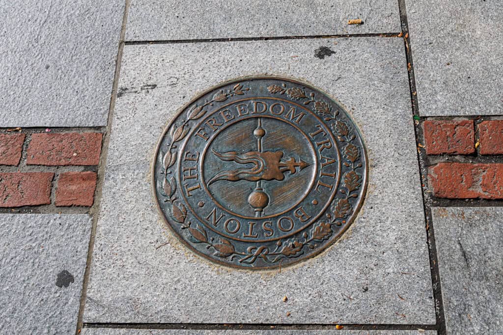 One of the many bronze markers of the Freedom Trail, Boston